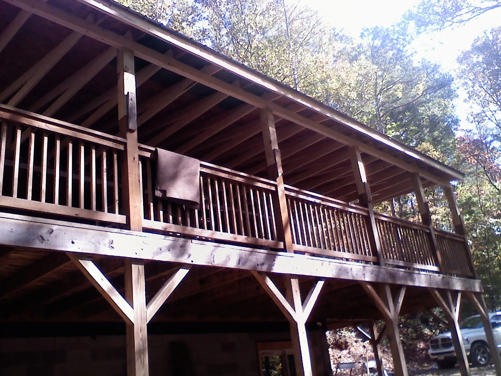Timber framing under a new elevated porch and deck — Roof Leak Repair in Ragland by Roofing Brothers